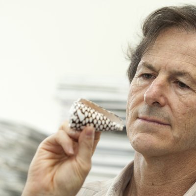 Professor Richard Lewis with a textile cone.